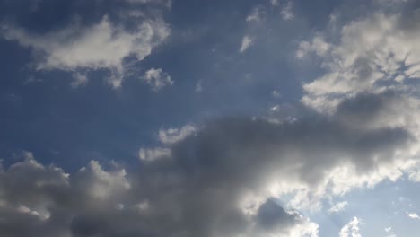 Mid-afternoon-thunderstorm-rain-clouds-forming-and-blending-across-the-african-horizon-time-lapse,-noise-free-4k-footage