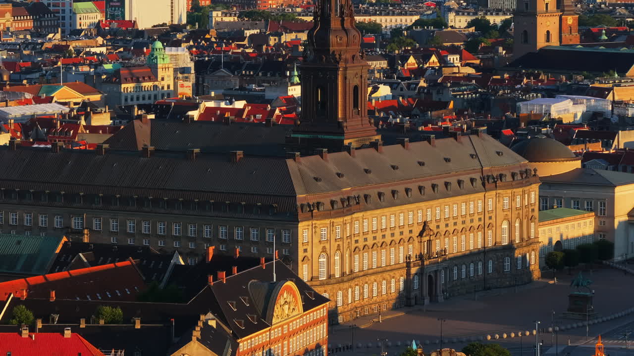 Aerial drone view of the Christiansborg Palace on the islet of Slotsholmen in central Copenhagen, Denmark at sunset