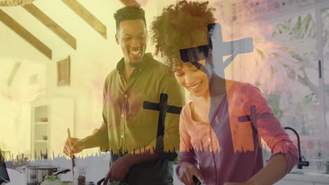 cruces y animación de hierba sobre una pareja sonriente cocinando juntos en la cocina