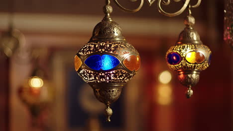 ornate moroccan style lamps with colorful glow