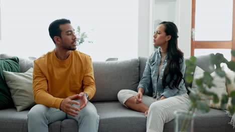 Woman,-man-and-fight-on-sofa-for-divorce