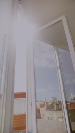 white folding doors with cityscape view