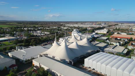 Aerial-drone-footage-of-the-famous-Butllins-holiday-camp-based-in-the-seaside-town-of-Skegness-Lancashire,-UK