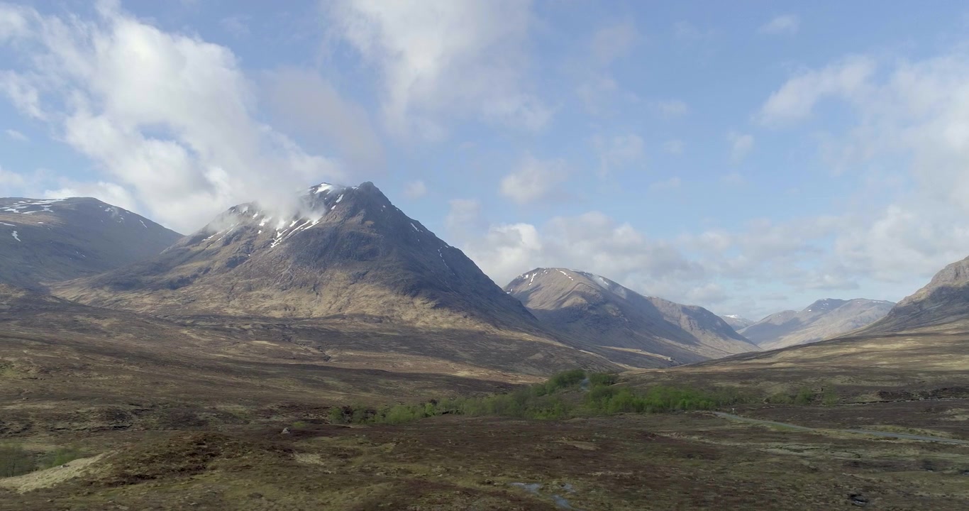 Aerial footage of the mountains and scenery in Glen Etive near Glencoe, Scottish Highlands