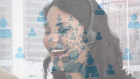 Animation-of-networks-of-connections-with-icons-over-businesswoman-using-phone-headsets