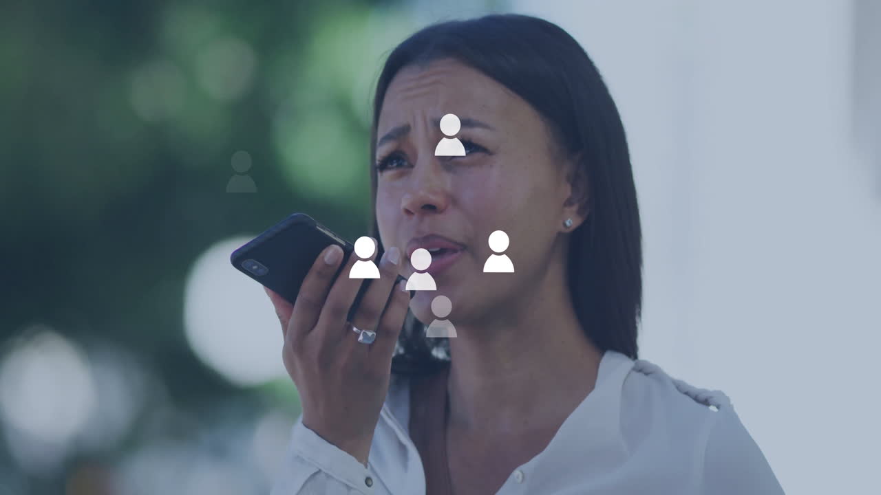 Using smartphone with animation of social media icons, worried woman outdoors