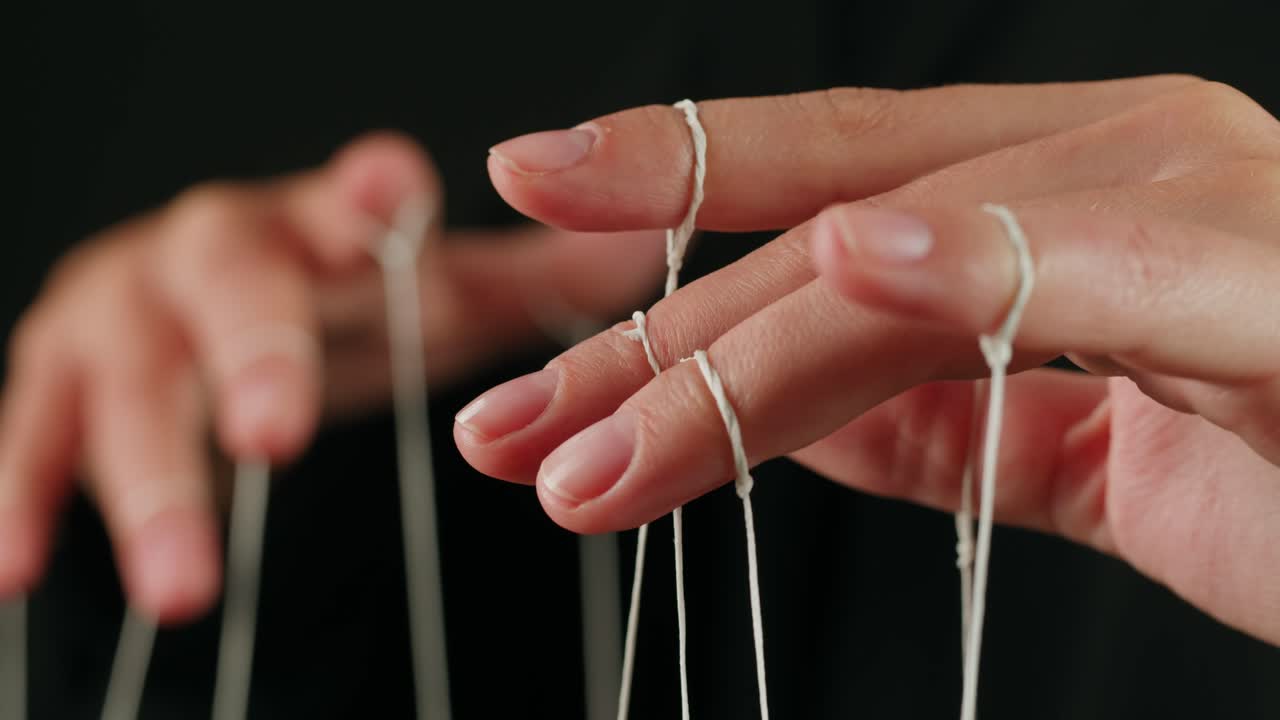 Human Hands Manipulating Strings Like a Puppeteer