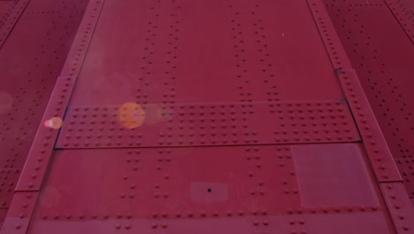 riveted steel structure of golden gate bridge tower in san francisco, california