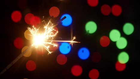 christmas sparkler. on a black background.