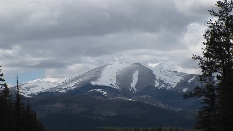 zoomin on a snowy mountain peak in the sierra blanca mountain range in new mexico