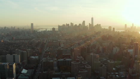 Urban-neighbourhood-from-height.-Aerial-panoramic-view-of-cityscape-against-sunset.-Manhattan,-New-York-City,-USA