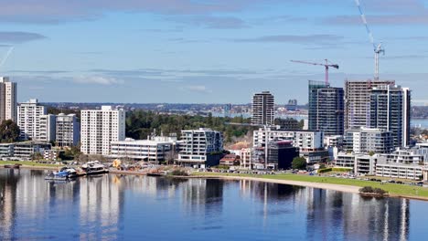 cranes tower over new construction in south perth, western australia