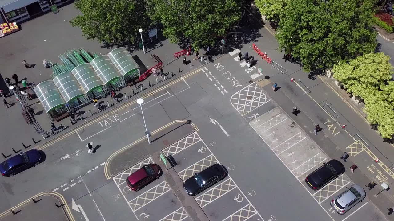 Aerial drone view of supermarket queue and the security allowing people in the line by groups to prevent  shopping store from overcrowding and obey social distance rule