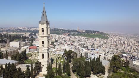 Aerial-footage-of-a-large-church-tower-in-old-city-Jerusalem