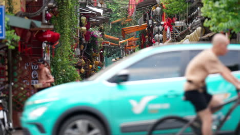 vibrant street scene in hanoi, vietnam with train tracks