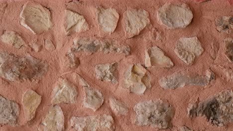 primer plano de una pared de piedra rústica