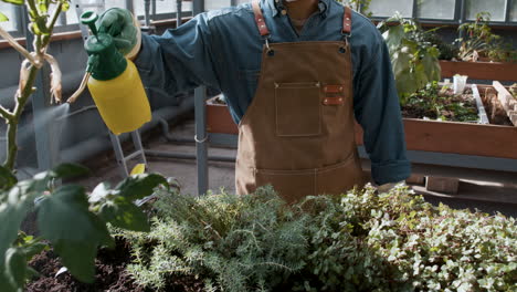 male gardener working indoors