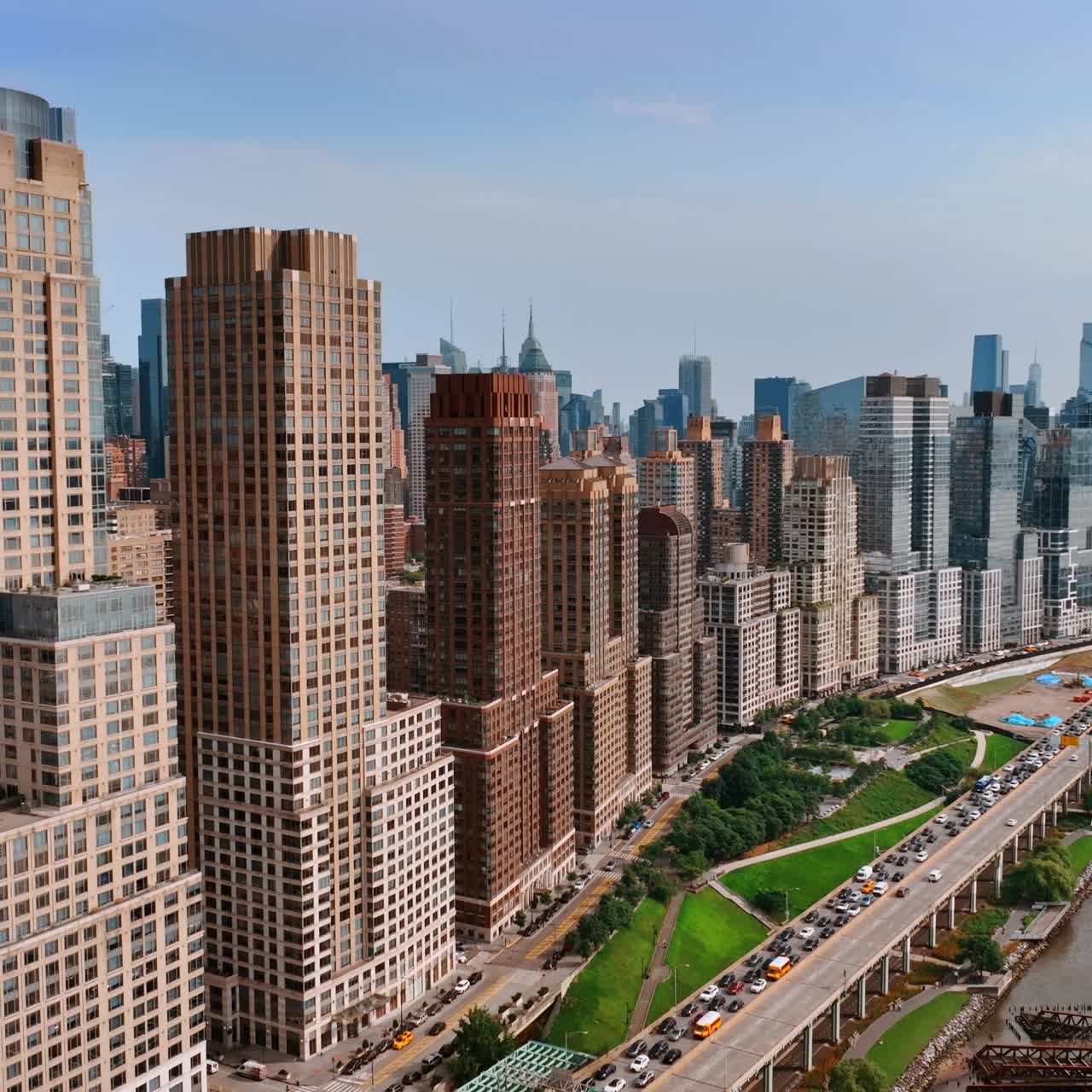 New York city buildifing on aerial view. Flying backwards above nyc city