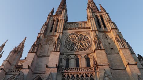 bordeaux cathedral front side of the church wide shot moving tilt up during sunrise