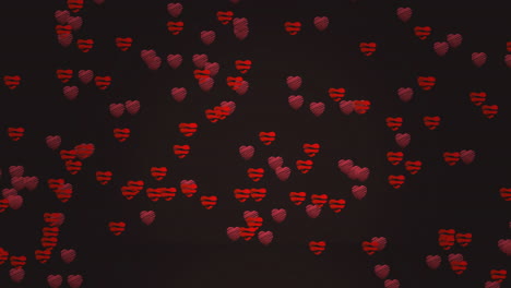 animación de corazones rojos flotando sobre un fondo negro