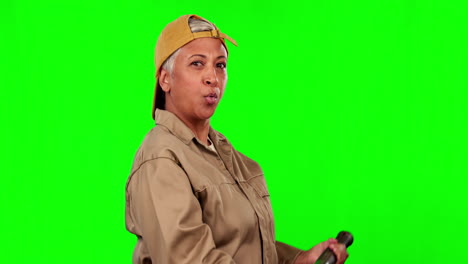 Face,-senior-woman-and-hammer-on-green-screen