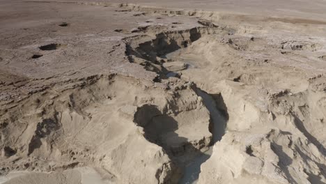 aerial view of a dry canyon and sinkholes