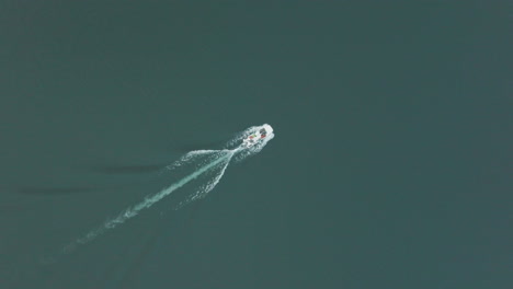 stunning birds eye view of a boat gliding over the water in argentina