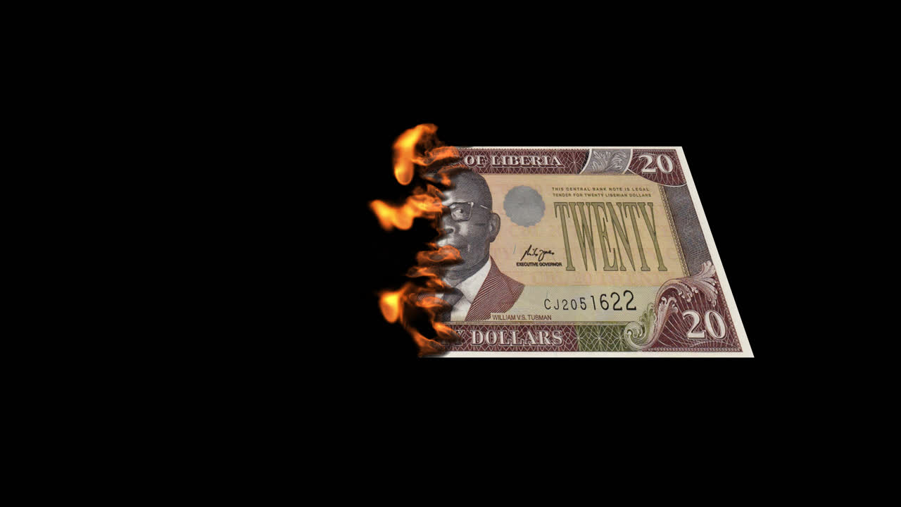 20리베리아 달러 지폐를 불태우고 있다.