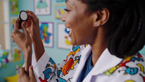 happy doctor in a colorful playroom