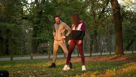 couple exercising in the park