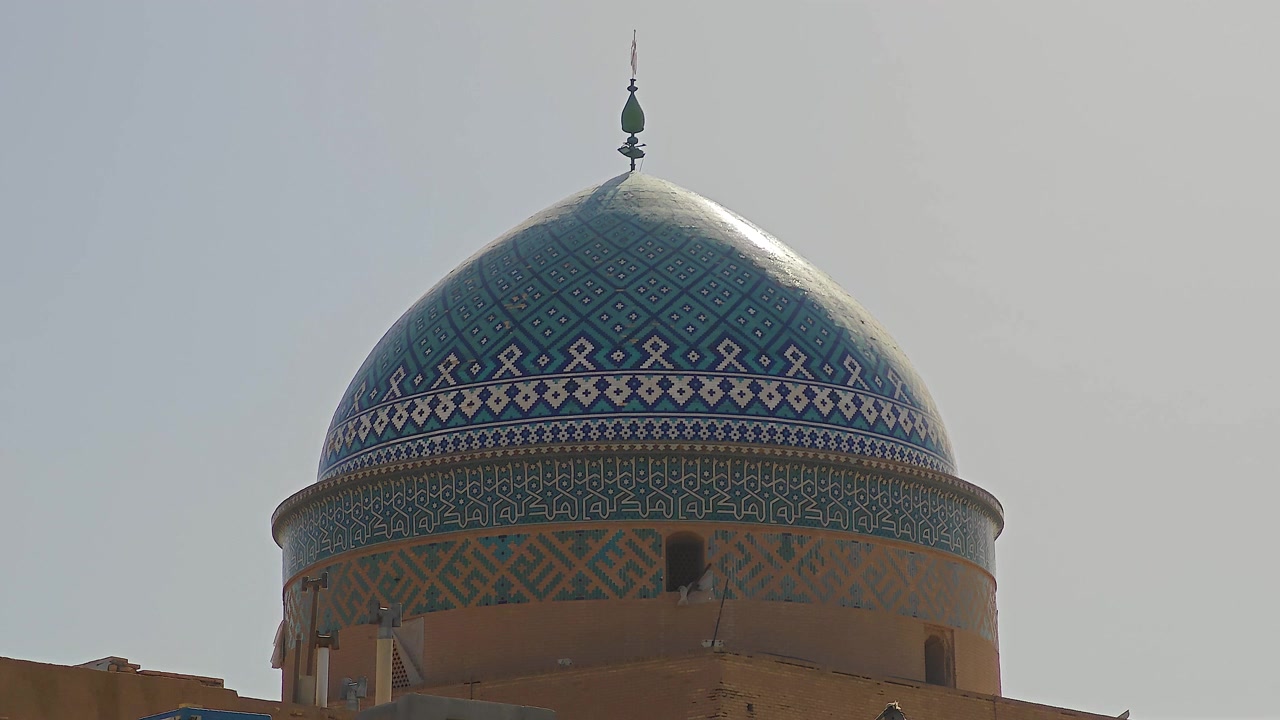 Intricate Blue Tiled Dome of a Historic Mosque