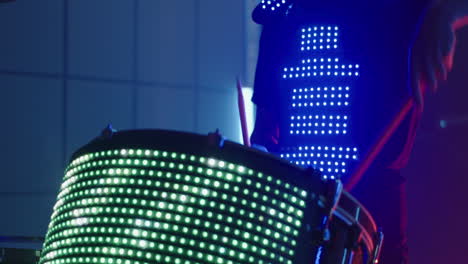 drummer with led drum set and vest
