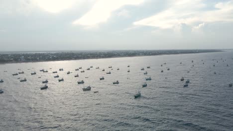 Aerial-Drone-Shot-of-Small-Traditional-Sri-Lankan-Fishing-Boats-Anchored