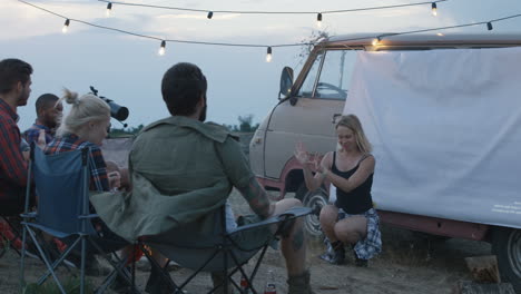 friends enjoying an outdoor movie night
