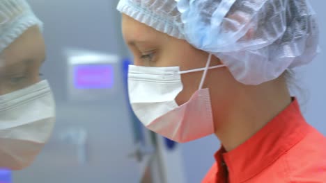 Pharmaceutical-worker-face-in-protective-suit.-Laboratory-scientist-portrait