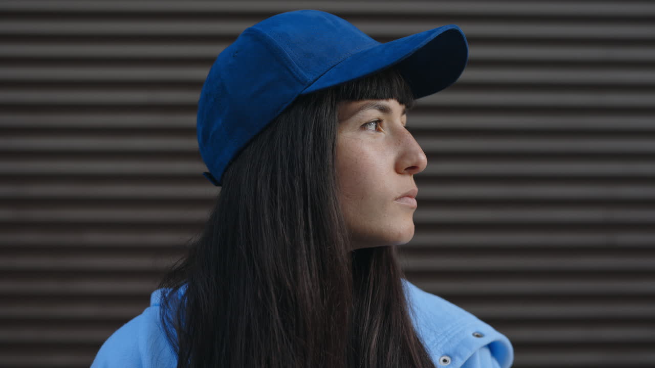 Woman in Baseball Cap Portrait
