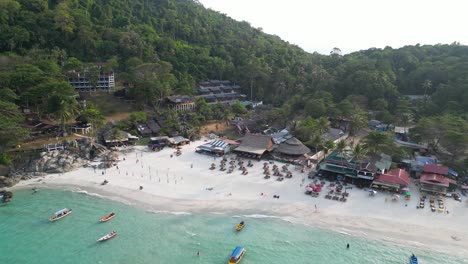 A-stunning-aerial-view-of-Long-Beach-in-Malaysia,-showcasing-its-beautiful-coastline,-clear-waters,-and-beachside-vacation-spots