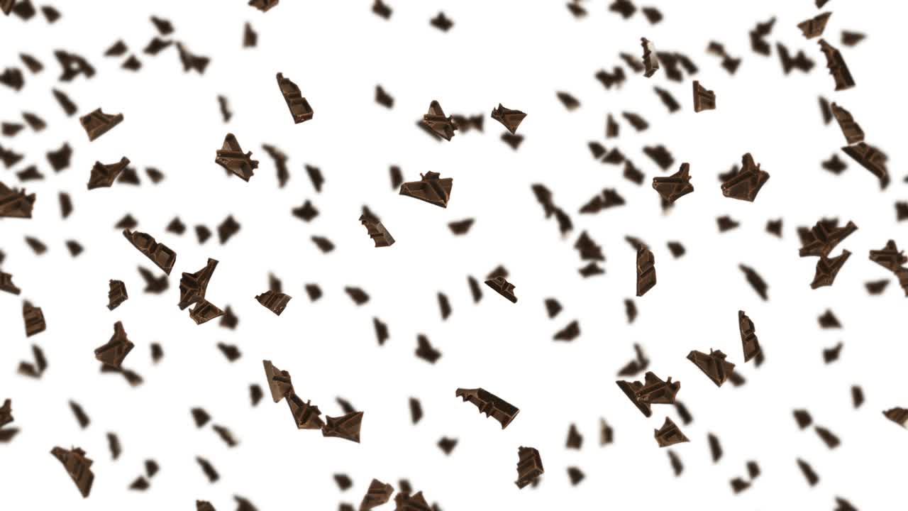 Flying many chocolate pieces on black background. Foods and sweets. Milk and dark. 3D loop animation of chocolate rotating.
