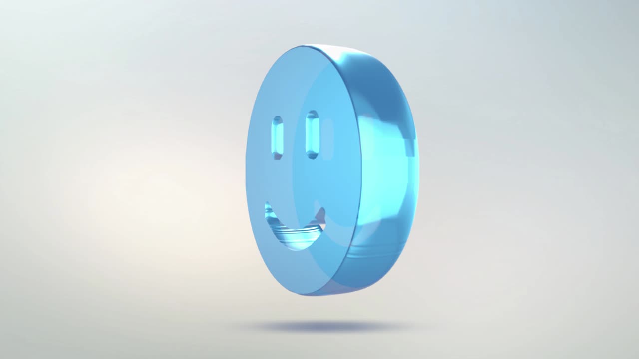 미소 아이콘은 유리로 만들어져 있으며, 알파 채널의 파란색과 녹색을 가진 반투명한 회전 미소 이콘이 있습니다.