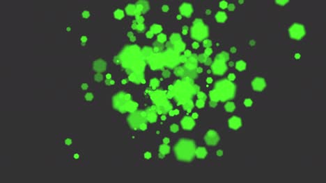 partículas verdes y bokeh redondo en un fondo brillante