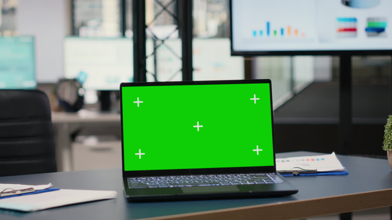 Empty dynamic space in a multinational company with isolated laptop screen