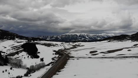 drone shot in the country of the mountains during winter