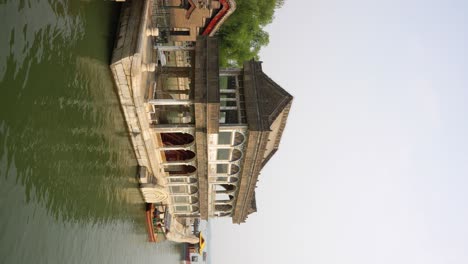 marble boat docked on the water at the summer palace, a symbol of luxury in beijing, china