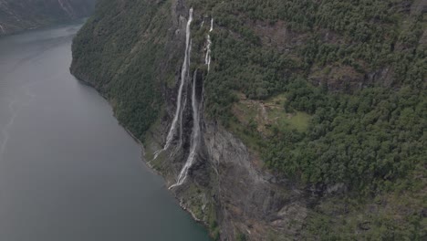 Aerial-approaching-view-of-seven-sisters-waterfall-in-geiranger-fjord,-Norway