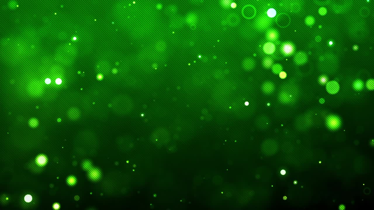 Abstrakt baggrund af grønne ufokuserede lys.