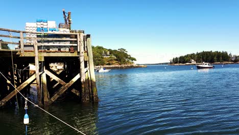 five island lobster pound on wharf showing islands and boats