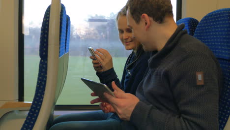 friends with gadgets on train