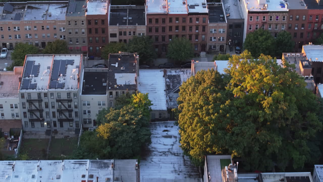 Aerial View of a Densely Populated City Neighborhood at Sunset