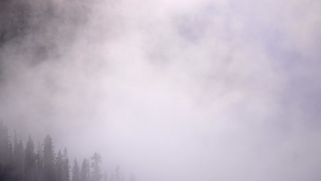 timelapse of rolling clouds in the mountain of the canadian rockies.
