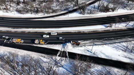 an aerial view of a highway after a heavy snowfall